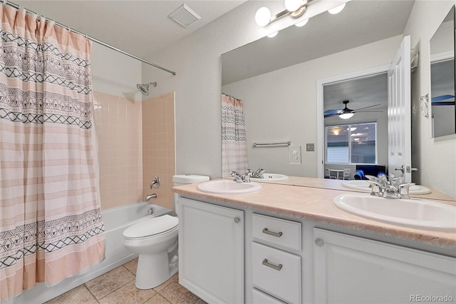 bathroom with visible vents, a sink, shower / tub combo with curtain, and double vanity