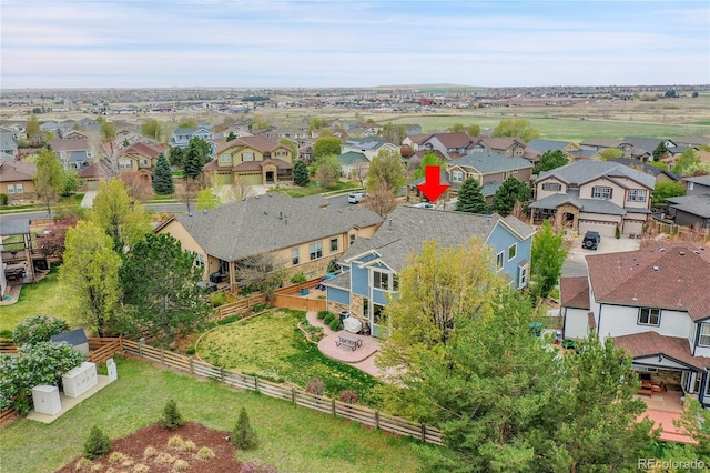 drone / aerial view with a residential view
