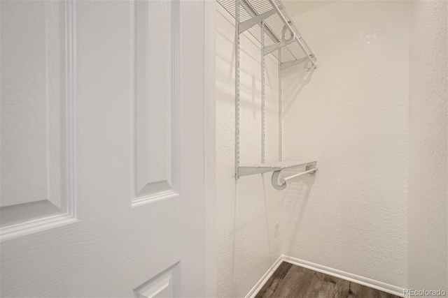 3401 W Milan Ave, Denver, CO 80236 - spacious closet featuring dark wood finished floors
