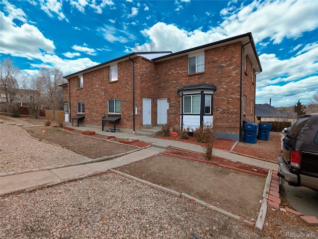 3401 W Milan Ave, Denver, CO 80236 - view of front facade featuring brick siding