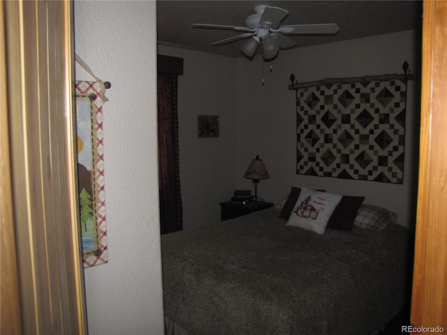 bedroom featuring ceiling fan