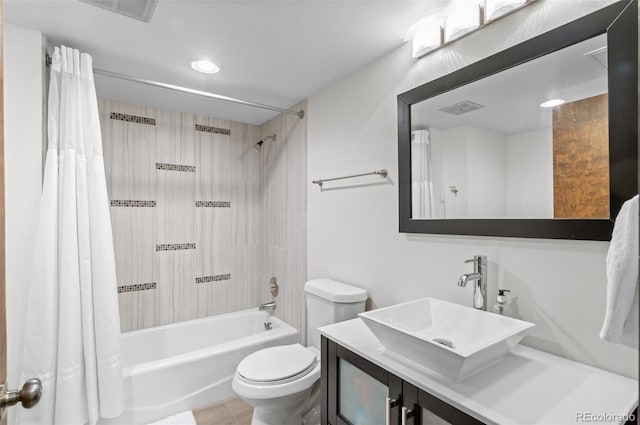 full bathroom with vanity, toilet, and shower / bath combo