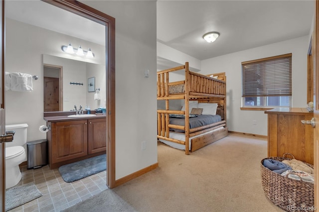 801 Trailhead Cir Unit 812, Winter Park, CO 80482 - bedroom featuring light carpet and connected bathroom