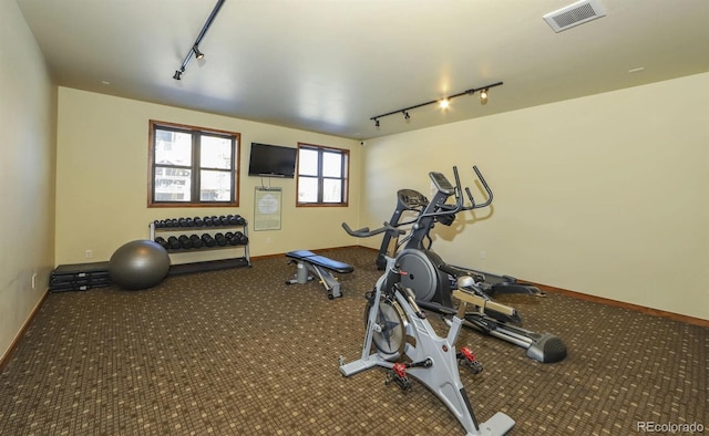 801 Trailhead Cir Unit 812, Winter Park, CO 80482 - workout room with rail lighting and carpet flooring