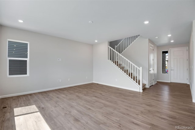 interior space with hardwood / wood-style floors