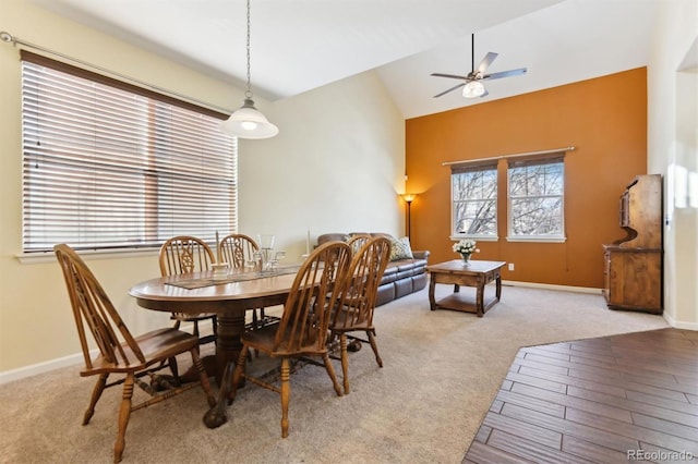 dining room with lofted ceiling and ceiling fan