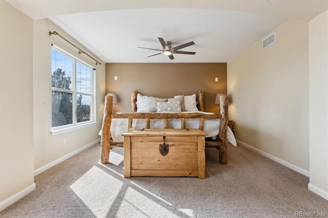 carpeted bedroom featuring ceiling fan