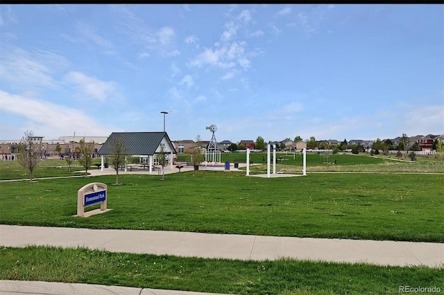 view of community with a gazebo and a yard