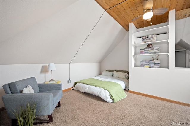 carpeted bedroom featuring vaulted ceiling and wooden ceiling