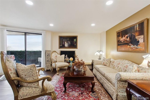 living room featuring wood finished floors and recessed lighting