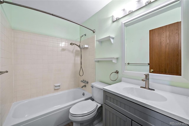 full bathroom with vanity, toilet, and tiled shower / bath combo