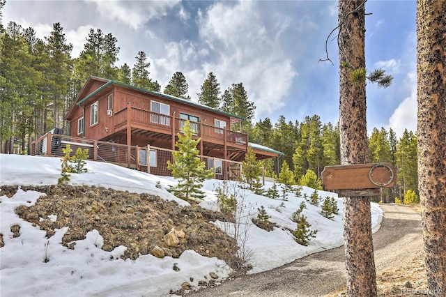 view of front of property featuring a wooden deck