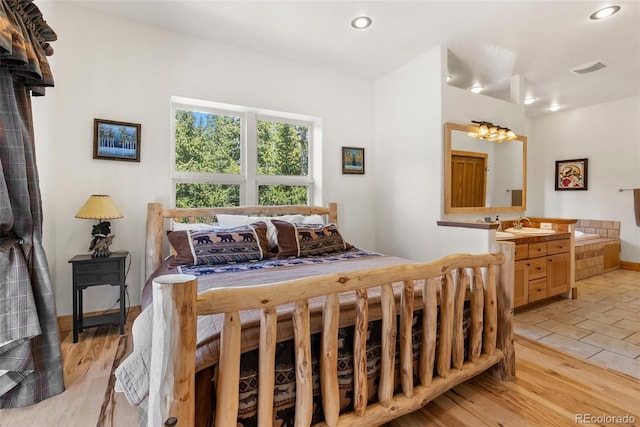 72 Overlook Ct, Idaho Springs, CO 80452 - bedroom with a sink, recessed lighting, and light wood finished floors