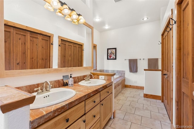 72 Overlook Ct, Idaho Springs, CO 80452 - full bath with a sink, tile patterned floors, baseboards, and double vanity