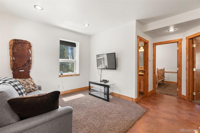 72 Overlook Ct, Idaho Springs, CO 80452 - living room featuring finished concrete flooring, baseboards, and recessed lighting