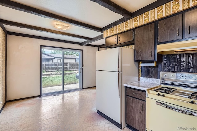 kitchen featuring white appliances, under cabinet range hood, baseboards, dark brown cabinets, and beam ceiling