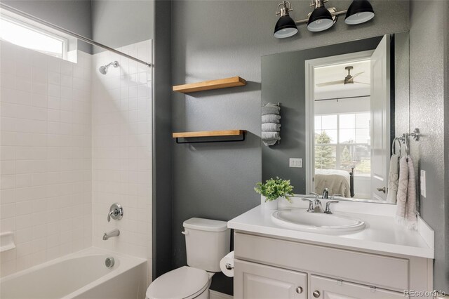 27653 E Euclid Dr, Aurora, CO 80016 - ensuite bathroom with toilet, washtub / shower combination, and vanity