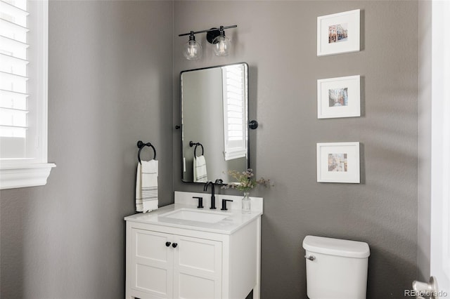 27653 E Euclid Dr, Aurora, CO 80016 - half bathroom featuring vanity and toilet