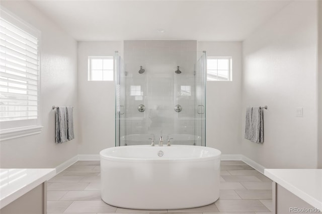 27653 E Euclid Dr, Aurora, CO 80016 - bathroom featuring vanity, plenty of natural light, and a shower stall
