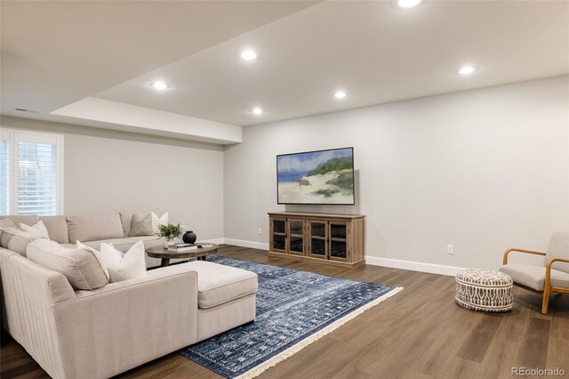 27653 E Euclid Dr, Aurora, CO 80016 - living area with baseboards, wood finished floors, and recessed lighting