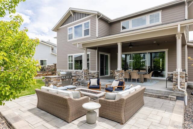 27653 E Euclid Dr, Aurora, CO 80016 - view of patio featuring an outdoor living space with a fire pit, a ceiling fan, and outdoor dining space