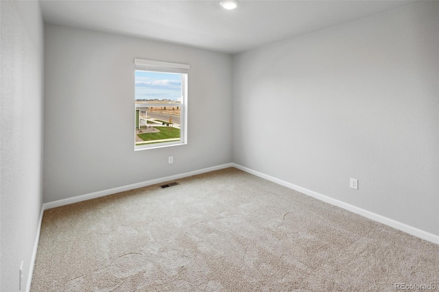2145 Alyssa St, Fort Lupton, CO 80621 - carpeted spare room featuring baseboards