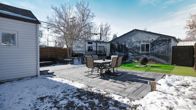 view of snow covered patio