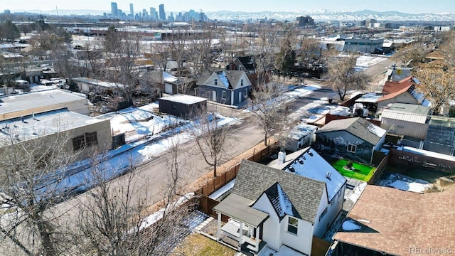 birds eye view of property featuring a mountain view