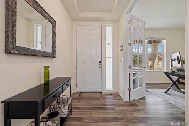 16341 Clayton St, Thornton, CO 80602 - foyer with wood finished floors and a tray ceiling