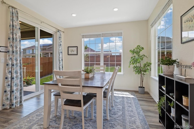 16341 Clayton St, Thornton, CO 80602 - dining room featuring wood finished floors and recessed lighting