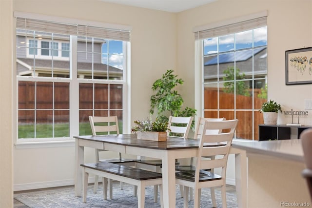 16341 Clayton St, Thornton, CO 80602 - dining area featuring healthy amount of natural light and wood finished floors