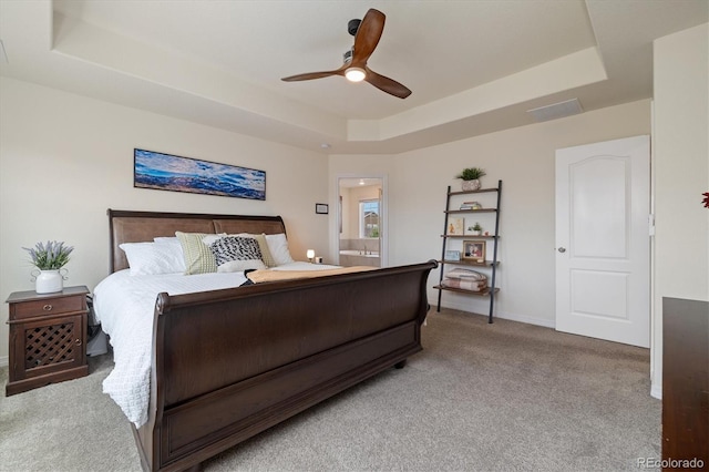 16341 Clayton St, Thornton, CO 80602 - bedroom featuring a raised ceiling, light colored carpet, and ceiling fan