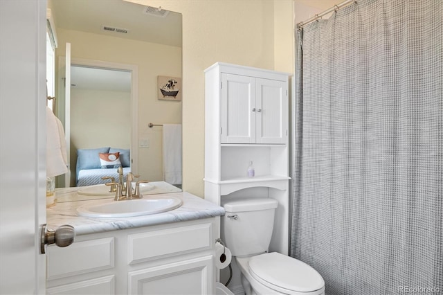 16341 Clayton St, Thornton, CO 80602 - bathroom featuring vanity, a shower with curtain, and connected bathroom