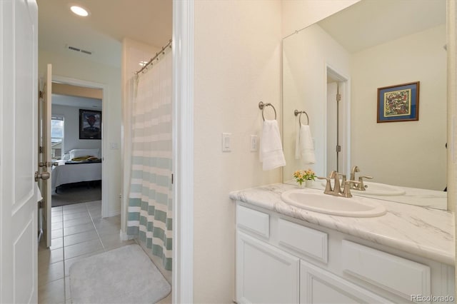 16341 Clayton St, Thornton, CO 80602 - bathroom featuring vanity, tile patterned flooring, and a shower with shower curtain