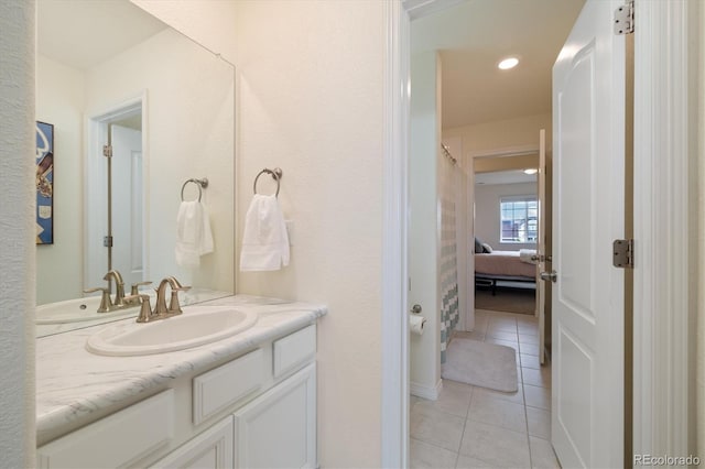 16341 Clayton St, Thornton, CO 80602 - full bath with tile patterned flooring, vanity, and recessed lighting