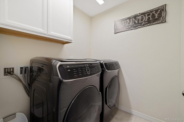 16341 Clayton St, Thornton, CO 80602 - laundry room featuring cabinet space, independent washer and dryer, and light tile patterned floors