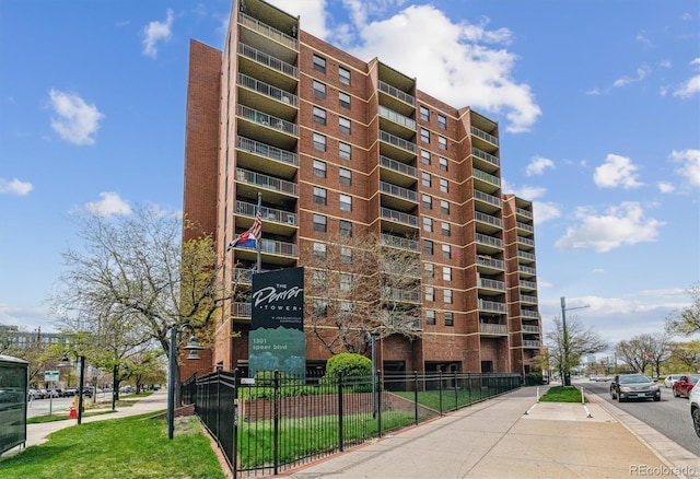 1301 Speer Blvd Unit 1108, Denver, CO 80204 - view of apartment building / complex featuring fence