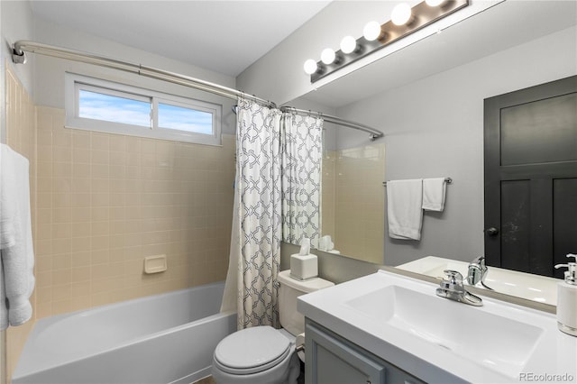 full bathroom with toilet, shower / bathtub combination with curtain, and vanity