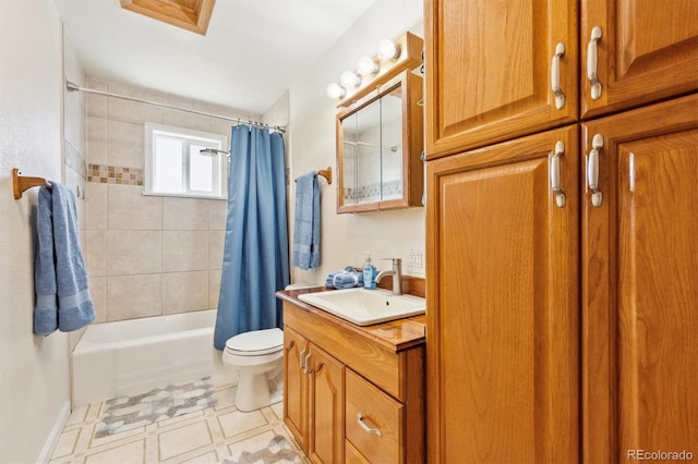 bathroom featuring tile patterned flooring, shower / tub combo with curtain, toilet, and vanity