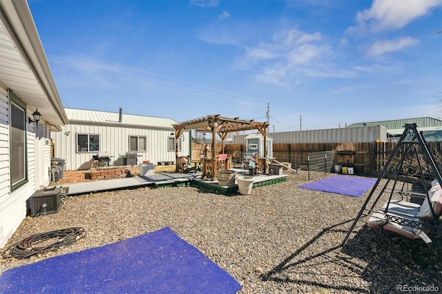 view of yard with a fenced backyard, a pergola, and a patio