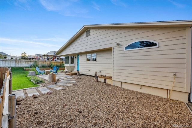 rear view of property featuring a patio