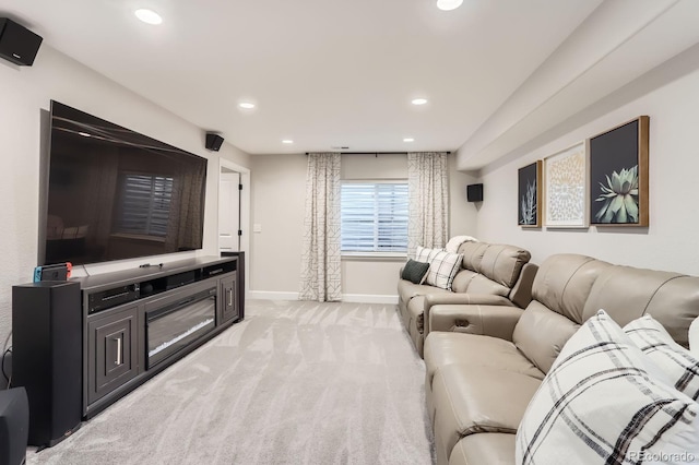 living room with light carpet, recessed lighting, and baseboards