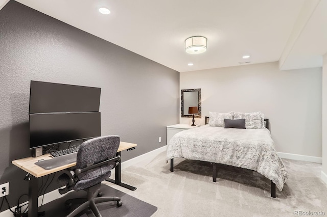 bedroom with an office area, carpet, baseboards, and recessed lighting