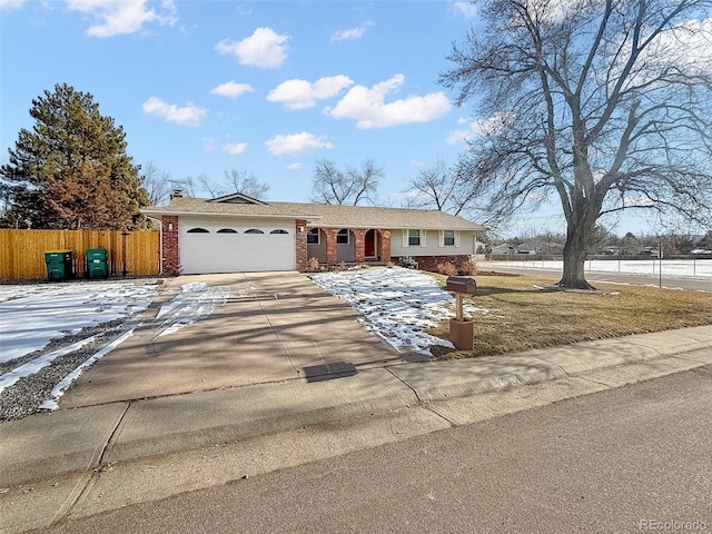 single story home featuring a garage