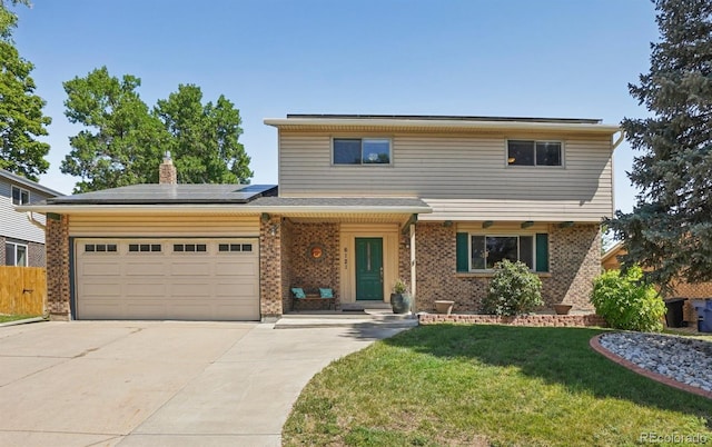 6121 W 108th Ave, Westminster, CO 80020 - traditional-style house featuring solar panels, brick siding, concrete driveway, and a garage