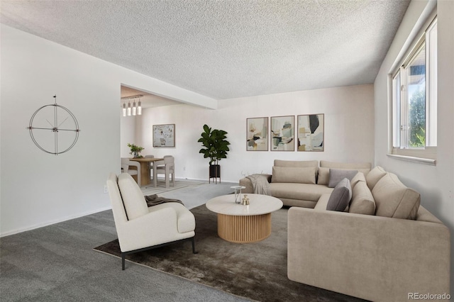 6121 W 108th Ave, Westminster, CO 80020 - living room with dark colored carpet and a textured ceiling