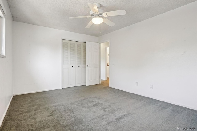6121 W 108th Ave, Westminster, CO 80020 - unfurnished bedroom featuring carpet flooring, a closet, a textured ceiling, and ceiling fan