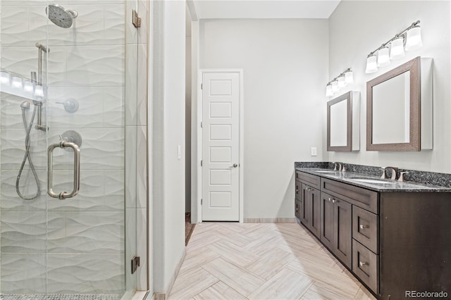 6532 S Tempe St, Aurora, CO 80016 - bathroom featuring double vanity and a stall shower