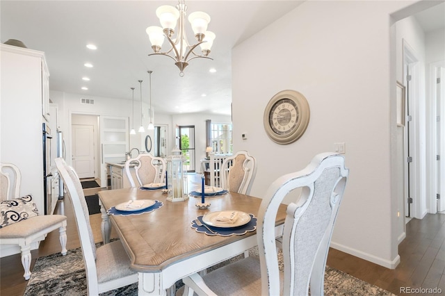 25049 E Alder Dr, Aurora, CO 80016 - dining room featuring recessed lighting, dark wood-style flooring, a chandelier, and baseboards
