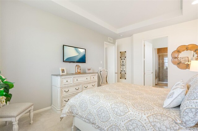 25049 E Alder Dr, Aurora, CO 80016 - bedroom with light carpet, baseboards, and a tray ceiling